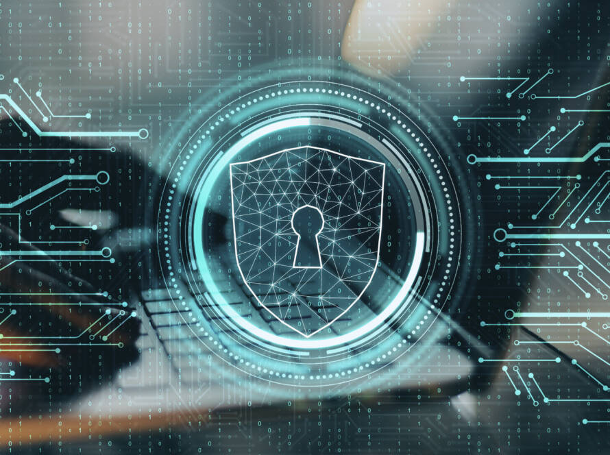 futuristic lock in front of a computer being used.