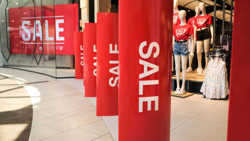mall with large printed sales signs