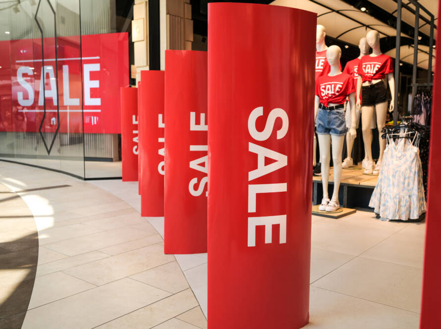 mall with large printed sales signs
